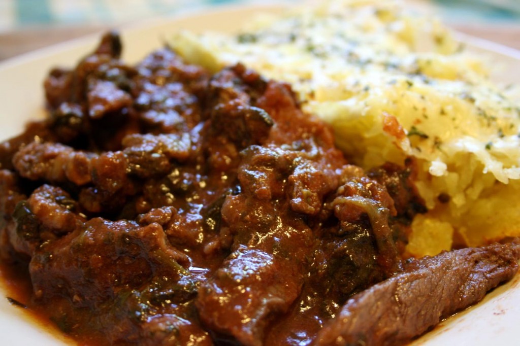 sauteed beef with tomato and spinach sauce